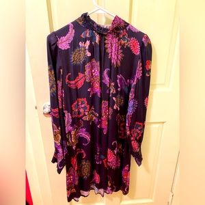 Elegant high neck shift dress, beautiful print, smocked sleeves.